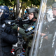 Police officers wearing riot gear shoot rubber bullets at demonstrators outside of the White House, June 1, 2020 in Washington D.C., during a protest over the police killing of George Floyd, an unarmed black man.